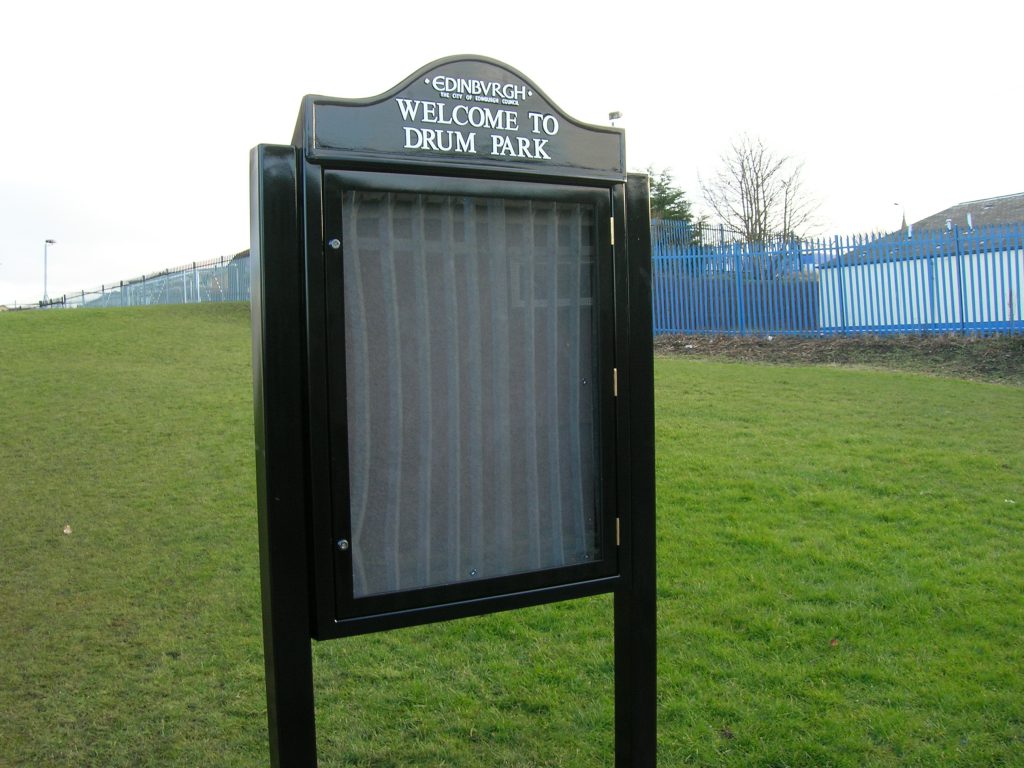 Metal notice board 1 door Drum Park close up