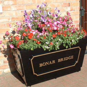 Metal planter wide and tall planted Bonar 3