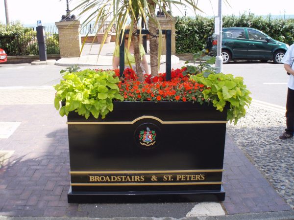 Metal planter wide and tall planted