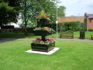 Metal planter tiered planted 6