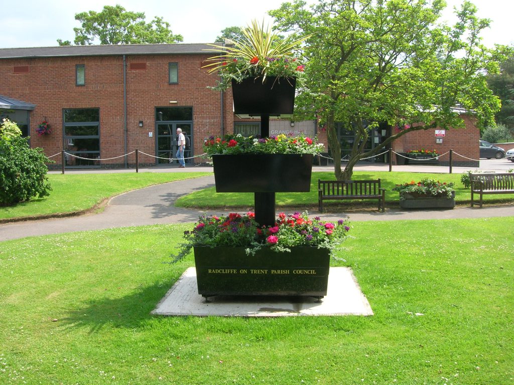 Metal planter tiered planted 7