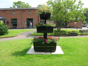 Metal planter tiered planted 7