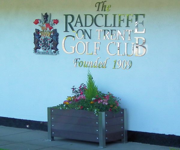 Recycled planter and sign
